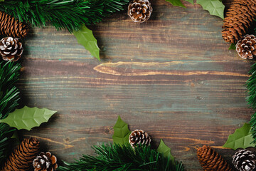 Poster - Christmas pine tree fir with pine cone decoration on vintage rustic wood table background