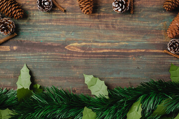Poster - Christmas pine tree fir with pine cone decoration on vintage rustic wood table background