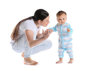 Sticker - Little baby boy learning to walk with his mother on white background