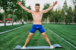 © VICHIZH - sporty muscular man goes in for sports in the park workout motivation