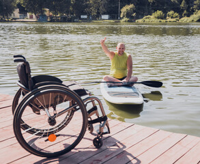 Person with a physical disability ride on sup board