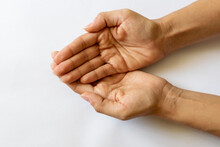 Hand Outstretched With White Background.