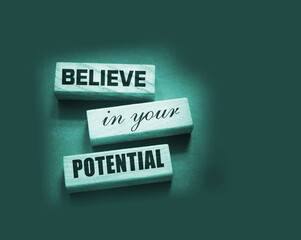 Believe in Your Potential word on wooden blocks. business or career concept