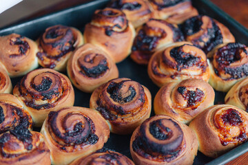 Wall Mural - Making yeast buns with jam and chocolate. Handmade homemade cakes.