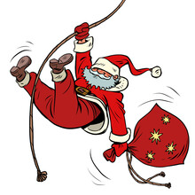 Santa Claus Descends On A Rope With Gifts. Christmas And New Year Winter Holidays