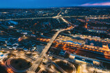 Fototapeta Miasto - Brest, Belarus. Aerial Bird's-eye View Of Cityscape Skyline. Night Traffic In Residential District