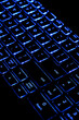 Computer keyboard highlighted in blue
