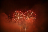 Fototapeta Dmuchawce - Fireworks at New Year. Abstract holiday background.