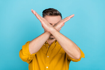 Poster - Photo of confident mature guy close his face crossed arms palms dont see discrimination isolated over blue color background