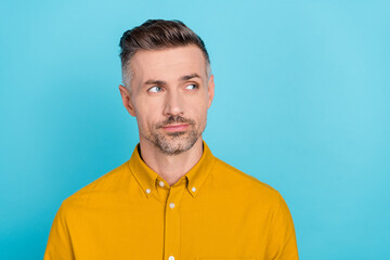 Wall Mural - Portrait of attractive minded man copy blank space overthinking deciding isolated over bright blue color background