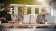 © goodluz - start-up in a team of three people working on a project