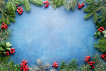 Wall Mural - christmas background with fir tree and holly berry with copy space.