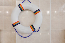 Life Preserver, Life Ring On A Wall In An Indoor Swimming Pool.