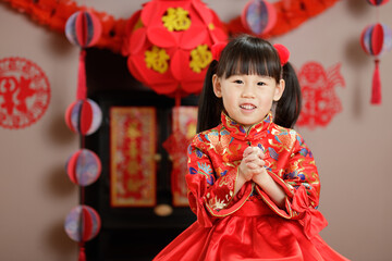 Wall Mural - young chinese girl with traditional dressing up celebrate Chinese new year