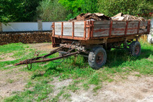 Trash Trailer In The Rustic Yard . Trailer From A Tractor In The Village