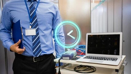Poster - Animation of clock moving fast over businessman with laptop by computer servers in tech room