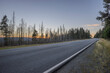 © Westend61 - Empty asphalt road in Harz National Park at dusk