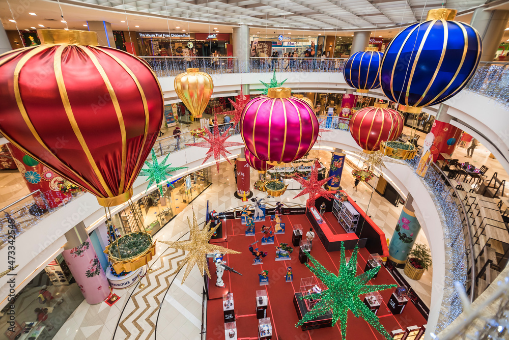 Divisoria, Manila, Philippines - Dec 2021: Christmas decorations line the atrium of Lucky Chinatown Mall in Binondo.