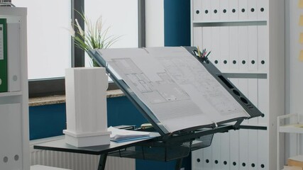 Poster - Close up of blueprints plan and building model on table in empty space used for construction and architectural project. Industrial sketch with urban real estate layout. Architecture design