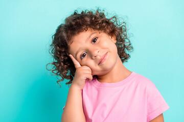 Photo of young small hispanic girl happy positive smile finger touch head isolated over turquoise color background