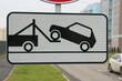 © mrivserg - road sign plate is working tow truck with reflective layer
