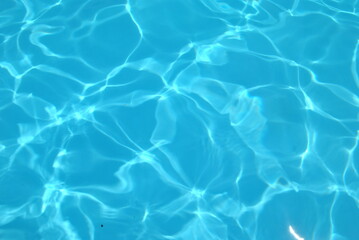  Blue ripped water in swimming pool . texture pool Shining blue water ripple background