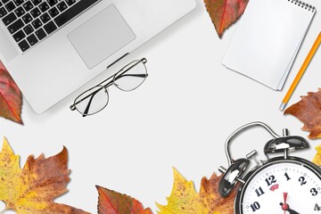 Wall Mural - Office desktop with keyboard, alarm clock with autumn leaves