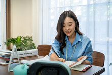 Happy Smiling Asian Business Woman Working At Office.