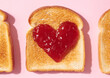 © Cavan Images - Toast with Heart Shaped Jam Closeup From Above