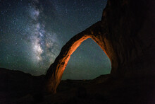 Stargazing Milky Way With Warm Glowing Arch In Foreground