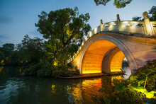 Arched Pedestrian Bridge At The Lake In The The Centre Of Guilin