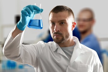 Poster - Serious concentrated young medical scientist, pharma chemist, biotech company employee, lab assistant