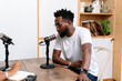 © PICHA - Man being interviewed for a podcast