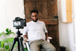 © PICHA - A Black man recording in a video interview