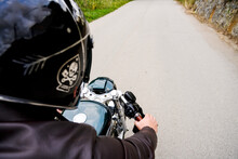 Point Of View Of Motorcycle Driver Riding On Country Side Road