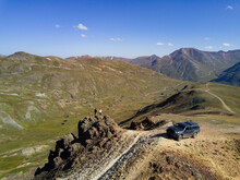 Young Adventurers Overlooking Landscape On 4x4 Road In Colorado
