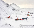 © Cavan Images - Heavy machinery for construction on snowy hill