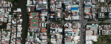 Aerial Map Panorama Of Phu My Hung District Of Ho Chi Minh City, Vietnam Featuring Canal And Tennis Courts On Sunny Clear Day