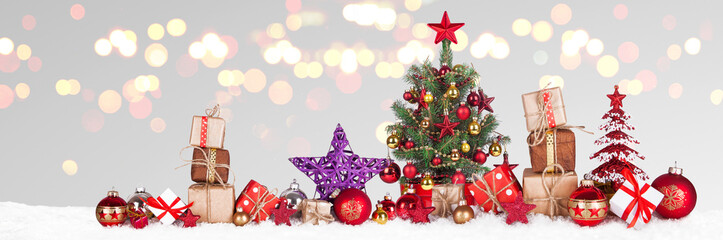 Wall Mural - christmas tree with decoration on a winter background.