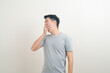 © topntp - young Asian man with yawn face
