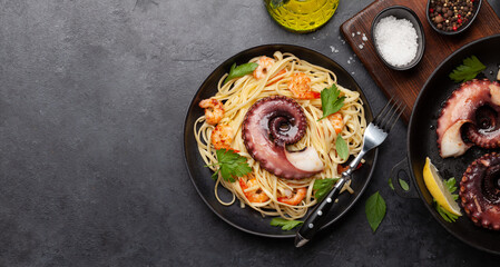 Canvas Print - Seafood pasta with octopus and shrimps