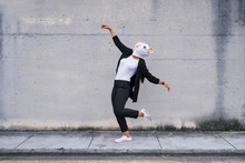 Woman In Mouse Mask Dancing On Street