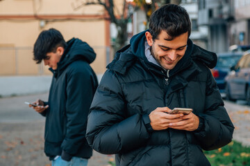 Poster - young people on the street with mobile phone