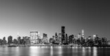 Fototapeta Most - Black and white panoramic view of the skyline of midtown Manhattan in New York by night
