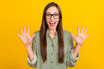 Canvas Print - Photo of young excited woman show palms information discount eyewear isolated over yellow color background