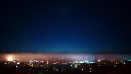 Poster - Fog on the night city and stars in the sky, loop video