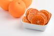 Orange chips and fresh orange, dried orange fruit