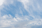 Fototapeta Niebo - Heavenly Serene Views of Soft Clouds and a Clear Blue Sky in the Background