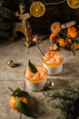panna cotta with tangerines on the background