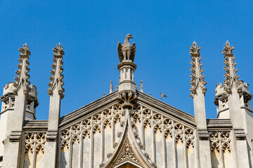 St John's College New Court and blank clock tower face, sunny day